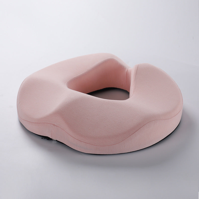 Un coussin de siège ergonomique en mousseà mémoire de forme rose