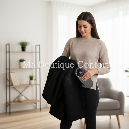 Femme  utilisant la brosse anti-poils sur manteau 