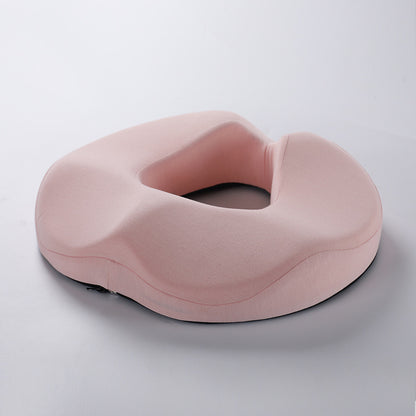 Un coussin de siège ergonomique en mousseà mémoire de forme rose
