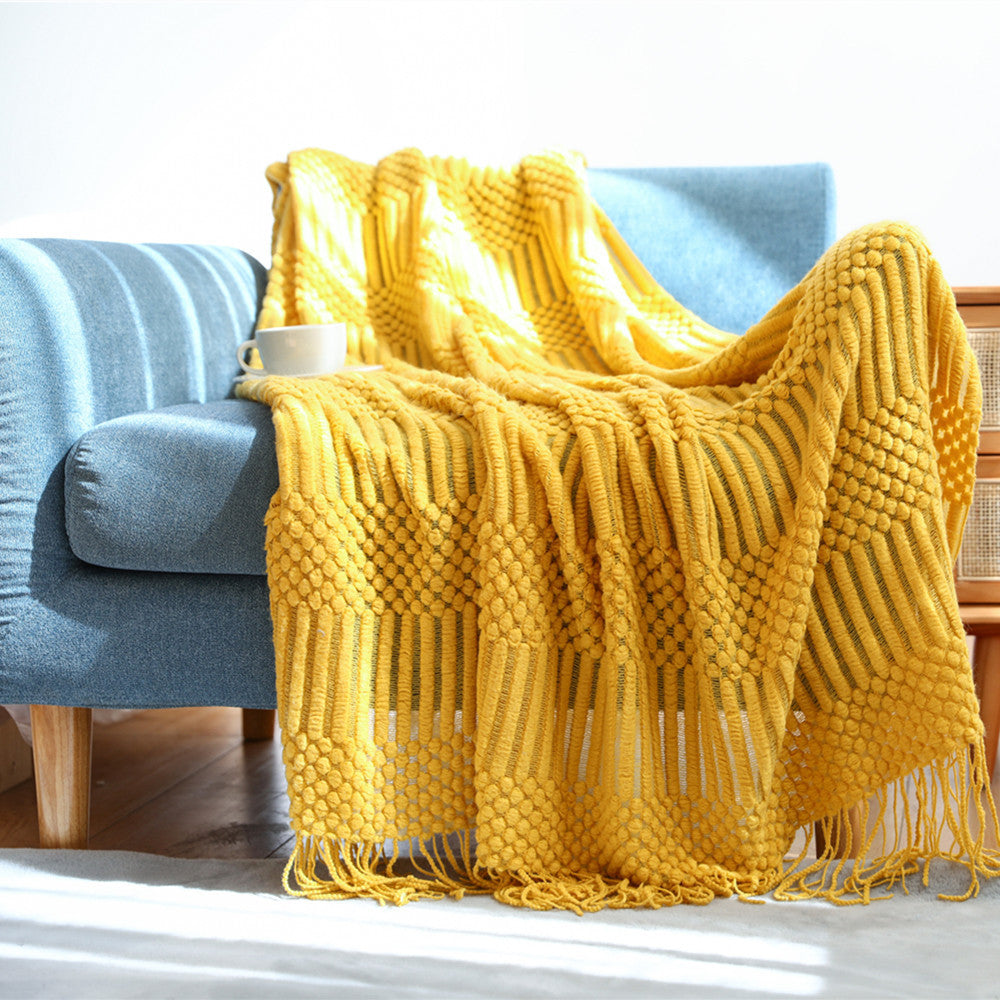 Plaid élégant posé sur le fauteuil