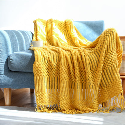 Plaid élégant posé sur le fauteuil